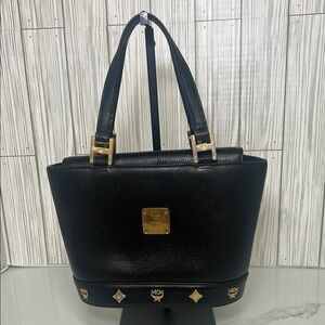 MCM Black Mini Tote with Gold Accents and Trapezoid Shape